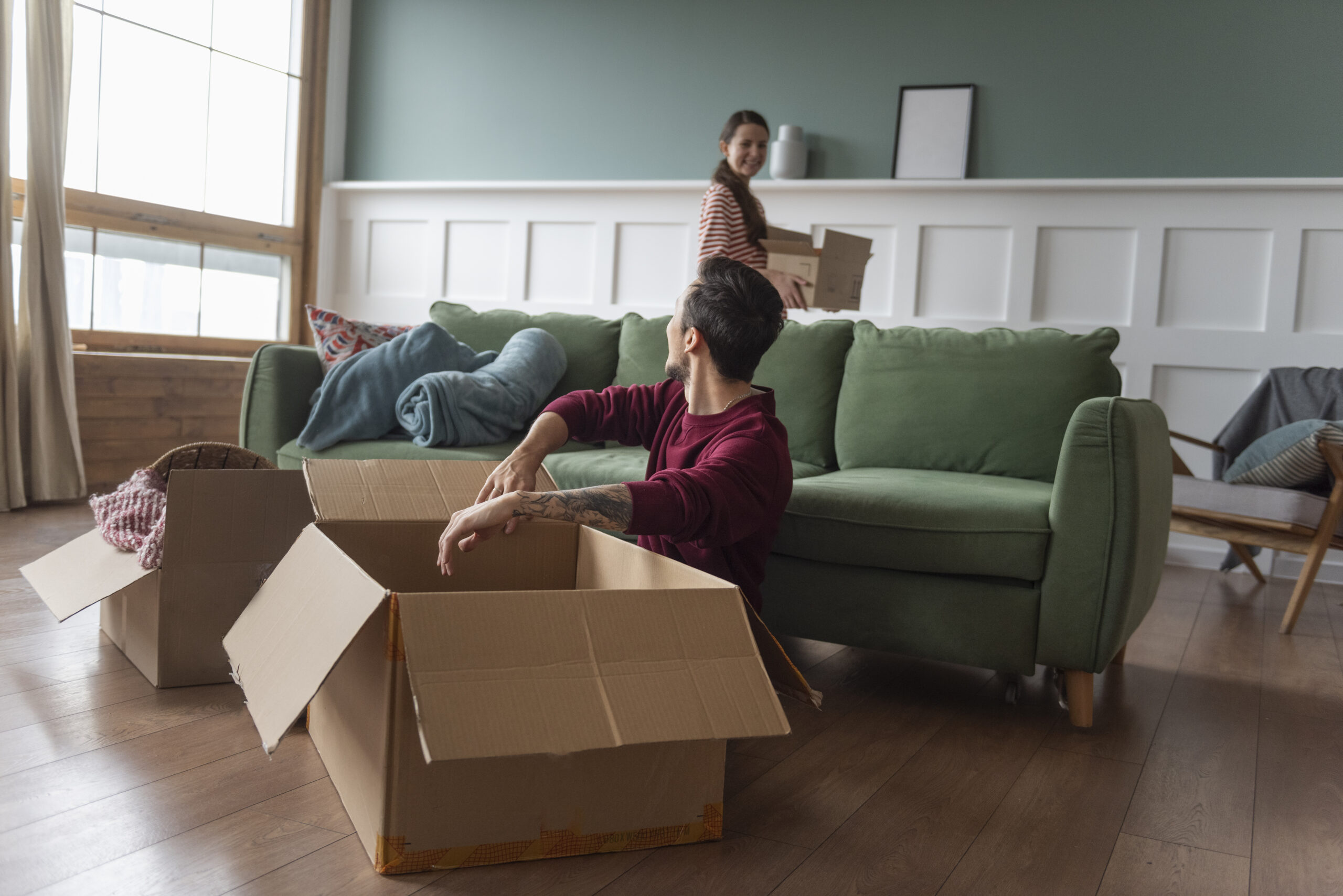 young-couple-moving-into-new-home